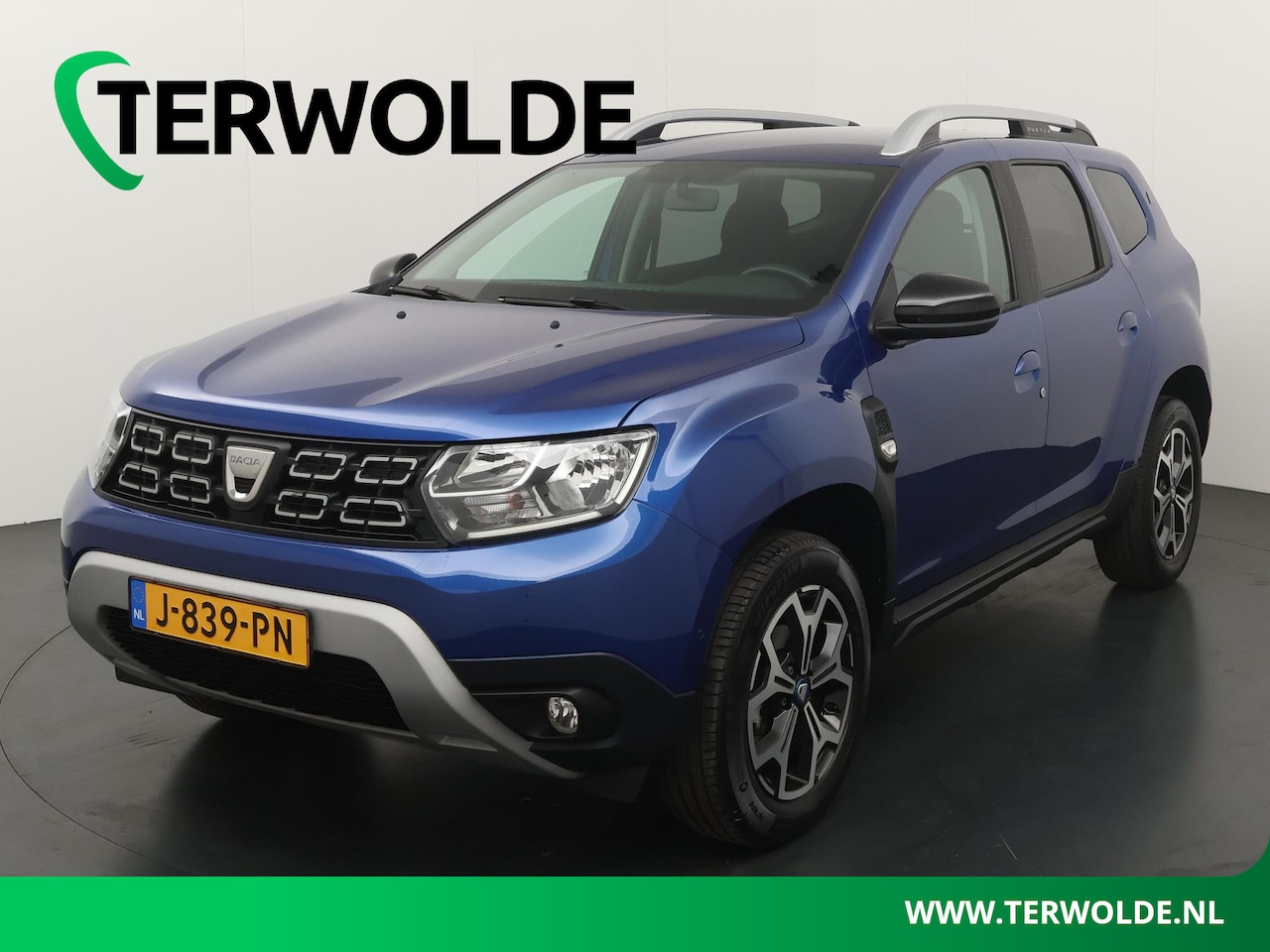 Dacia Duster - TCe 100 Bi-Fuel Série Limitée 15th Anniversary | Parkeercamera | Navigatie | Climate Contr - AutoWereld.nl