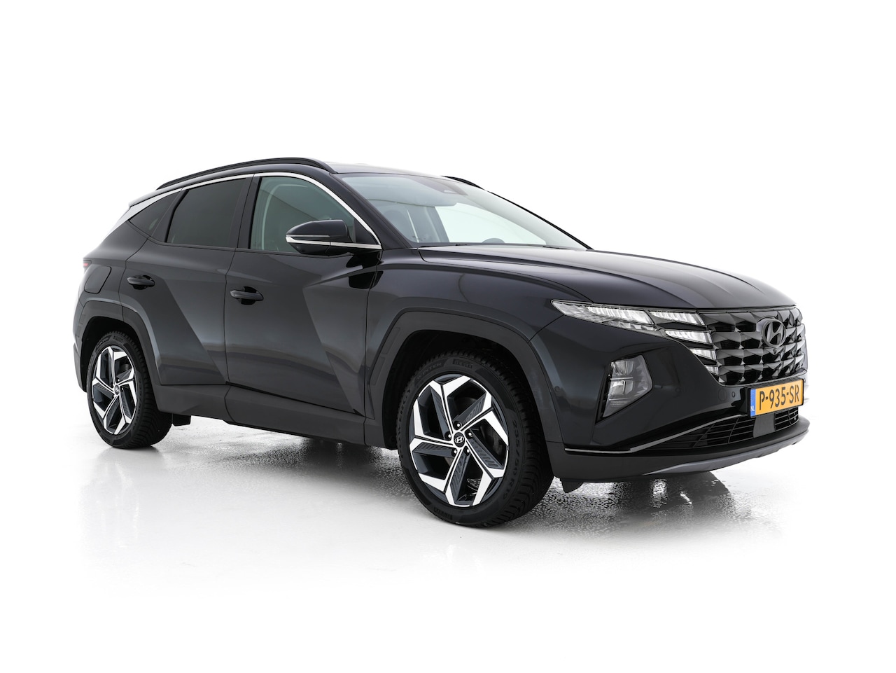Hyundai Tucson - 1.6 T-GDI PHEV Premium 4WD (INCL.BTW) *FULL-LEATER | FULL-LED | ADAPTIVE-CRUISE | BLIND-SP - AutoWereld.nl