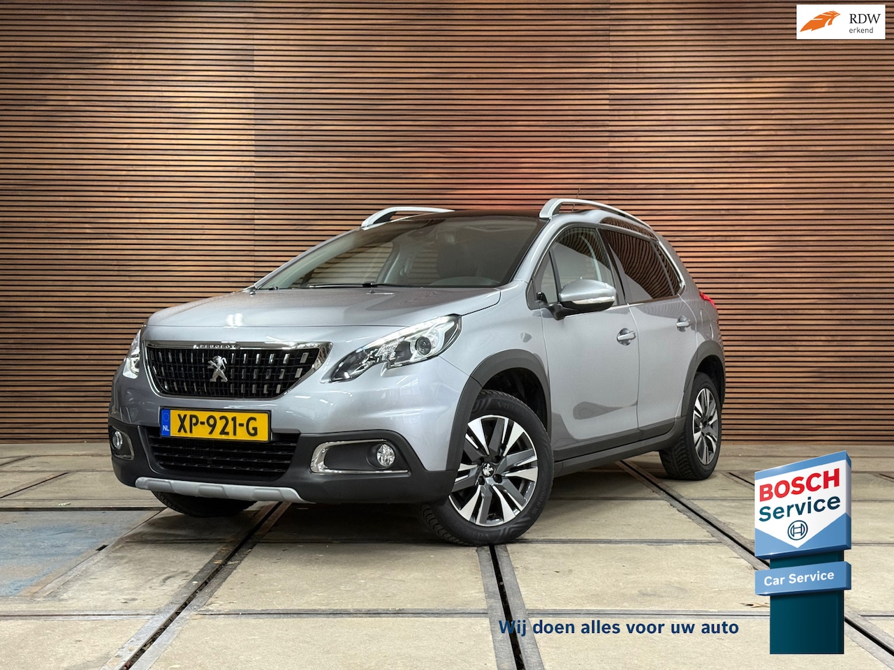 Peugeot 2008 - 1.2 PureTech 130 PK Allure | Half Leer | Trekhaak | 16' inch | Pano | Camera | Dealer Onde - AutoWereld.nl