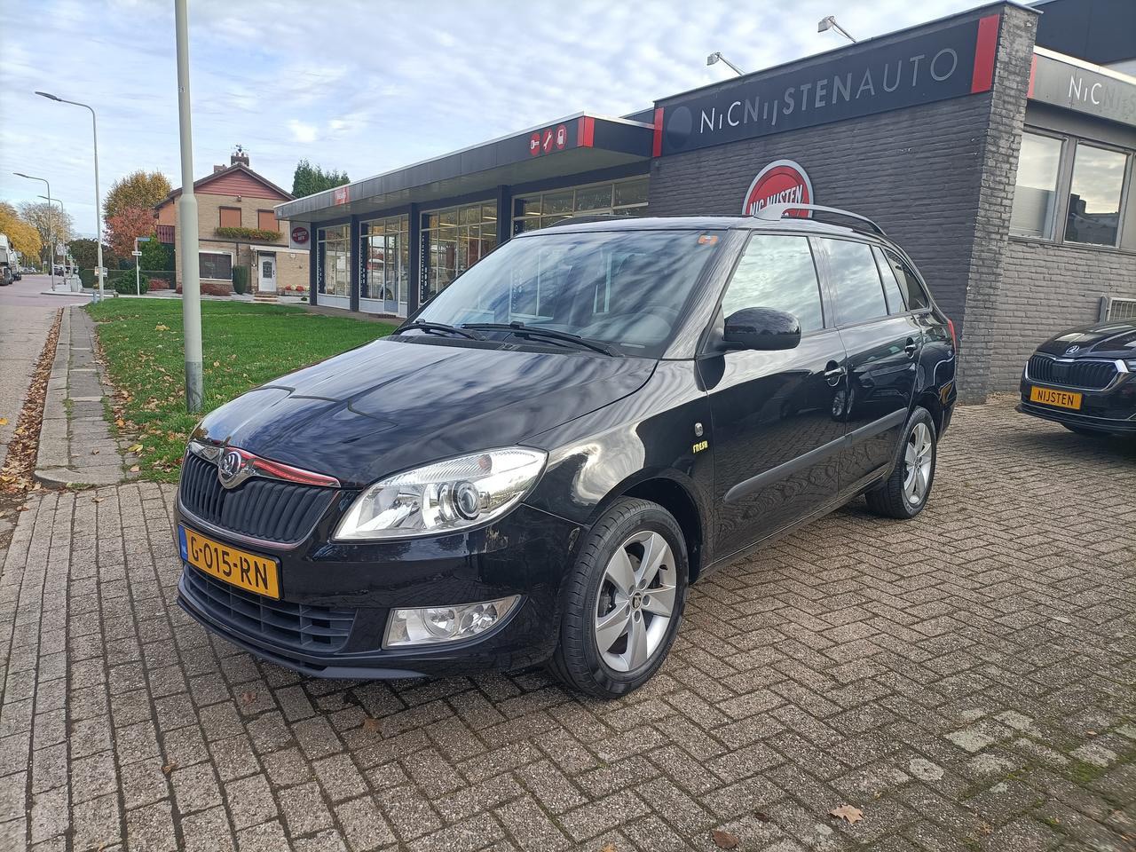 Skoda Fabia Combi - 1.2 Airco, Clima, Cruise, PDC , LM wielen - AutoWereld.nl