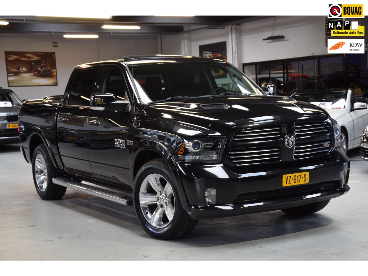 Dodge Ram 1500 - Sport 5.7 V8 Hemi Crew Cab Navi|Org.NL|2e eig.|Leder|Schuif/kantel-dak|Prins LPG|BTW - AutoWereld.nl