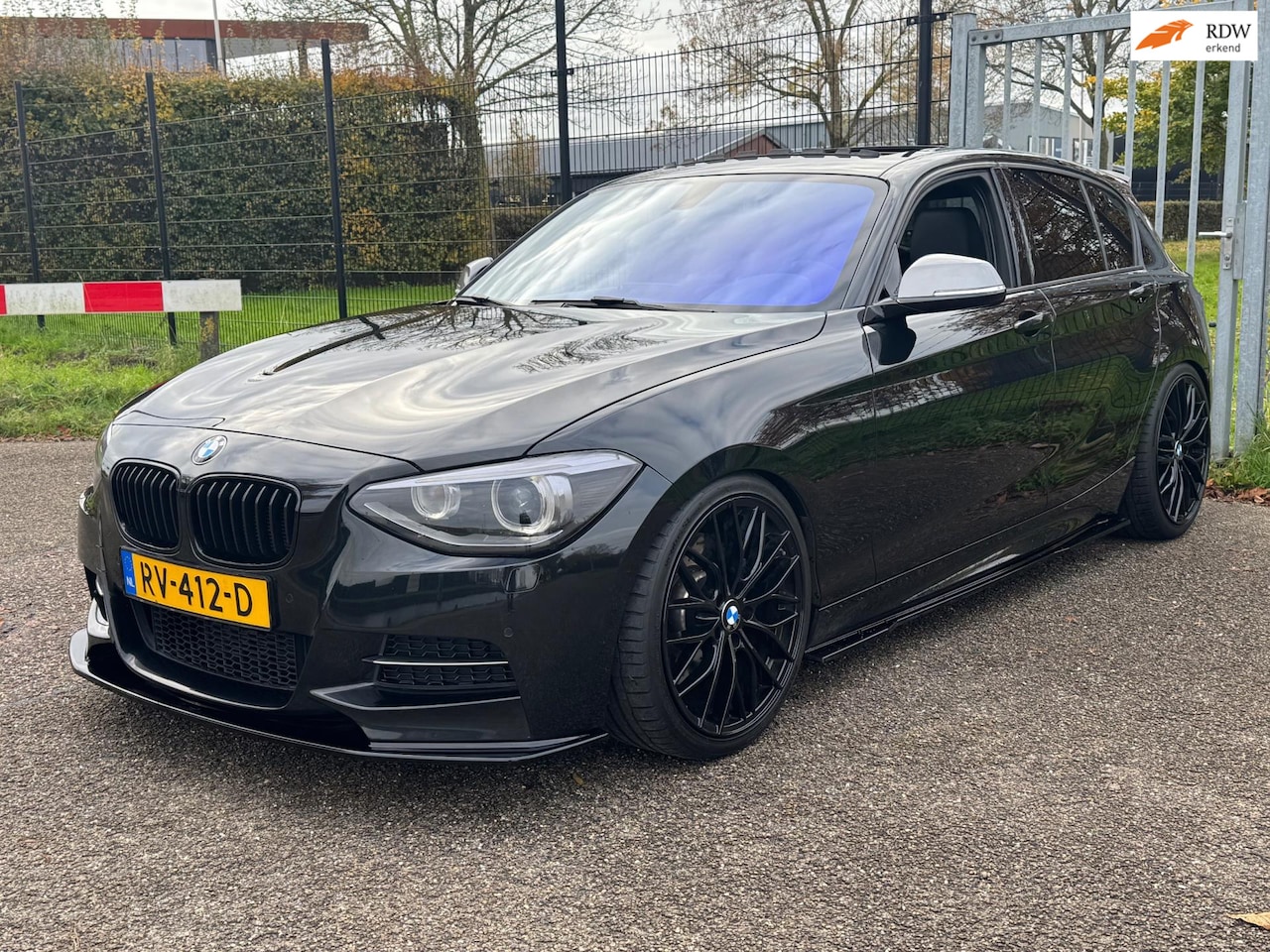BMW 1-serie - M135i xDrive Exe Opendak 19inch Performance - AutoWereld.nl