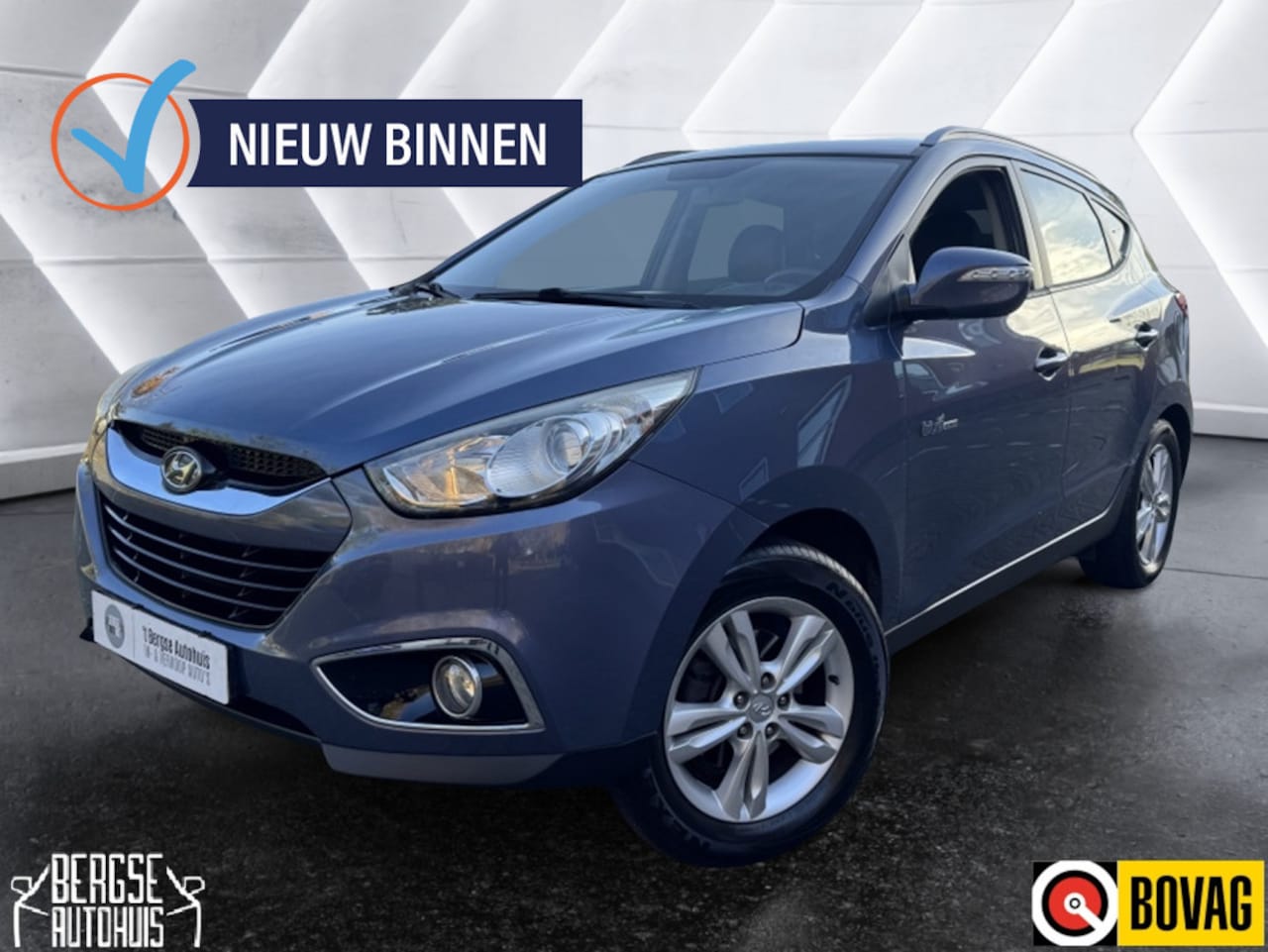 Hyundai ix35 - 1.6i GDI Business Ed Cruise Navi Ecc BT - AutoWereld.nl