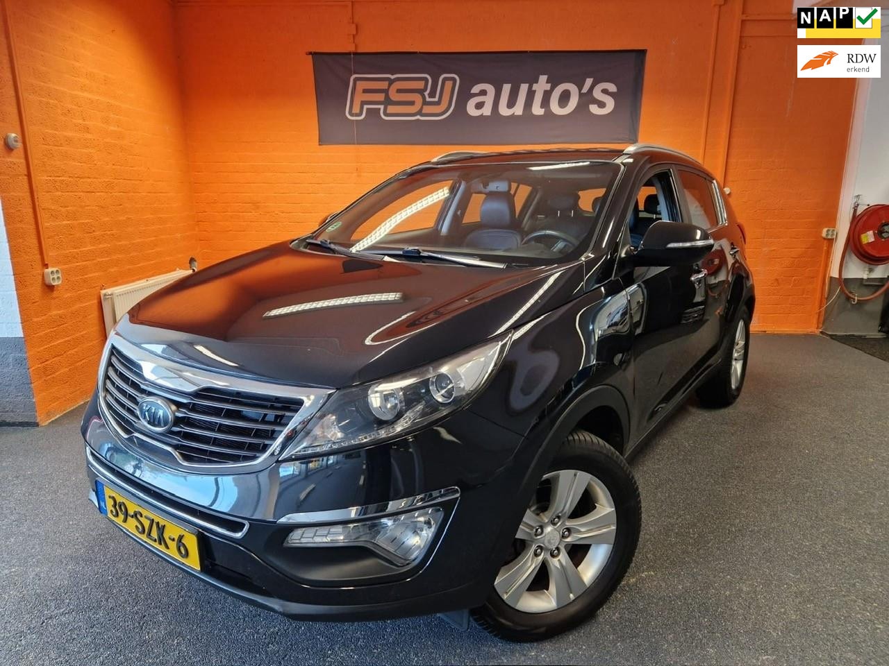 Kia Sportage - 2.0 X-ecutive Plus Pack / Div.Optie's / APK 31-10-2026 - AutoWereld.nl