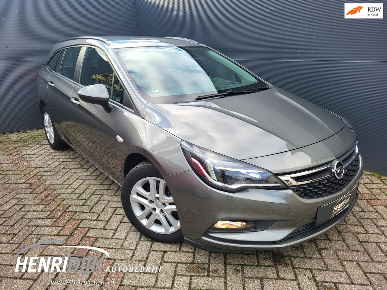 Opel Astra Sports Tourer - 1.4 Edition Camera / Cruise / DAB / AC / PDC - AutoWereld.nl