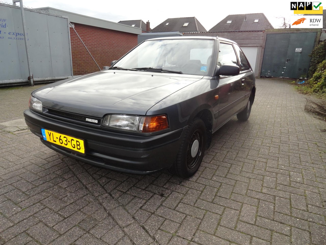 Mazda 323 - 1.6i AUT GLX (KM 126605 NAP) - AutoWereld.nl