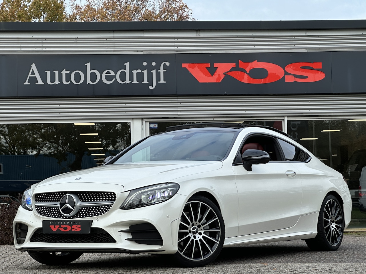 Mercedes-Benz C-klasse Coupé - 180 AMG-Line | Luchtvering | Burmester | Panodak | 360 camera - AutoWereld.nl