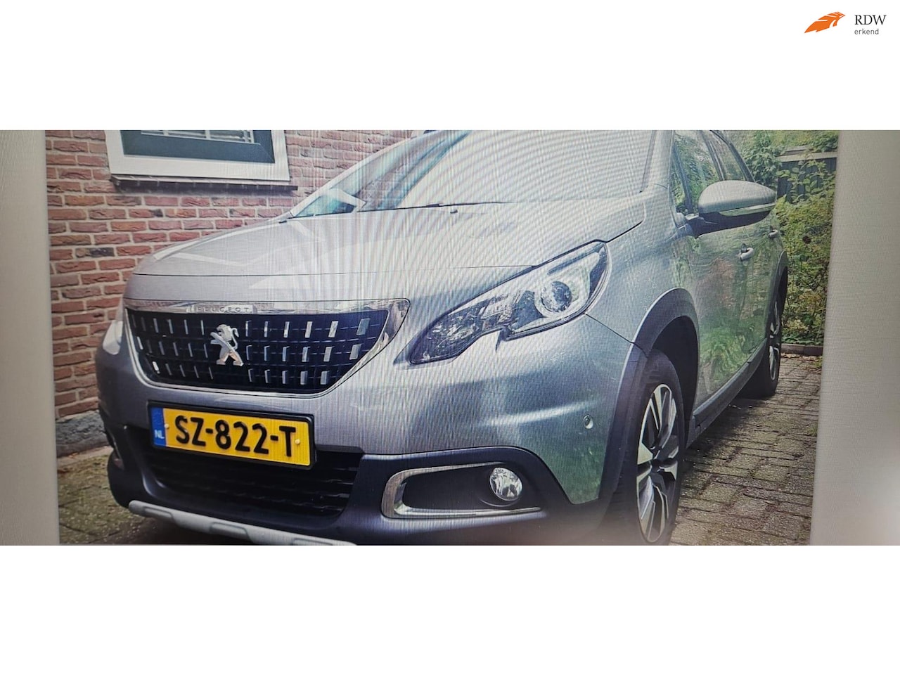 Peugeot 2008 - 1.2 PureTech Allure AUTOMAAT - AutoWereld.nl
