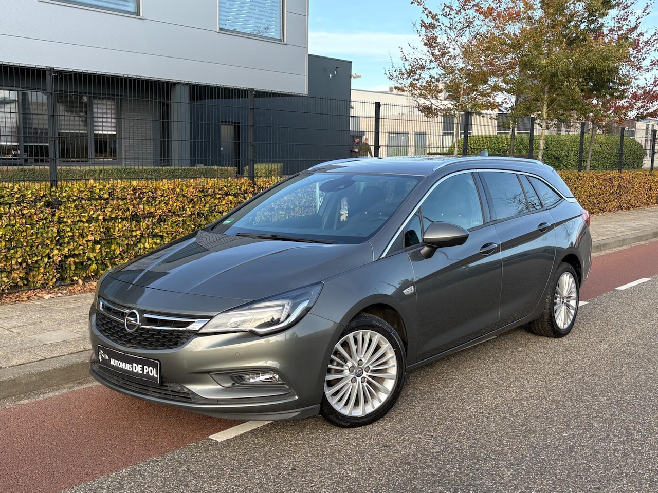 Opel Astra Sports Tourer - 1.4 Cruise/climate-controle add-up Navigatie stoel/stuur-vw pakeersensoren - AutoWereld.nl