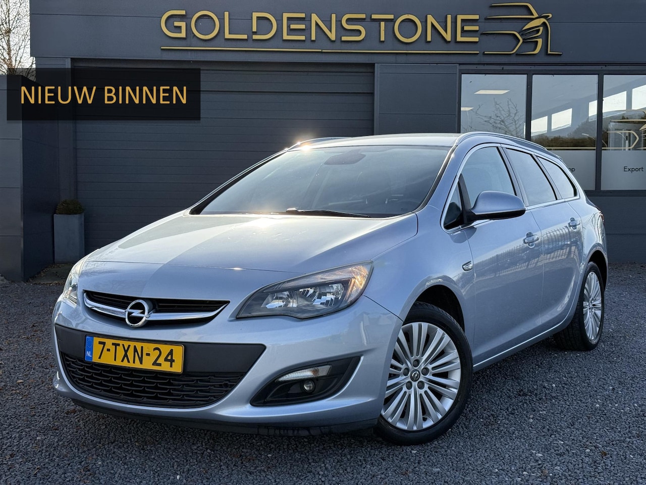 Opel Astra Sports Tourer - 1.4 Turbo Design Edition 2e Eiganaar,Navi,Pdc,120pk,Clima,Cruise,6 Bak,Lm velgen,N.A.P,Apk - AutoWereld.nl