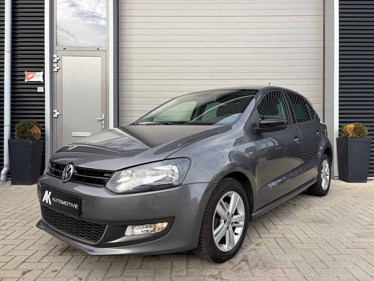 Volkswagen Polo - 1.2-12V Highline/Match/PDC/Cruise ctrl/Lichtmetaal/Full option - AutoWereld.nl