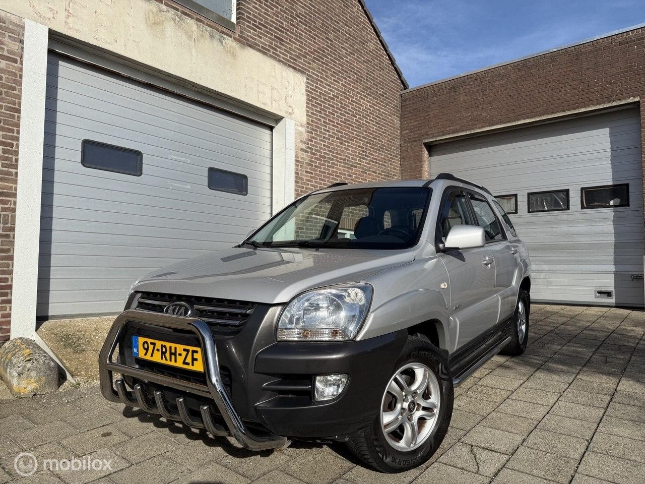 Kia Sportage - 2.0 CVVT Executive 2.0 CVVT Executive - AutoWereld.nl