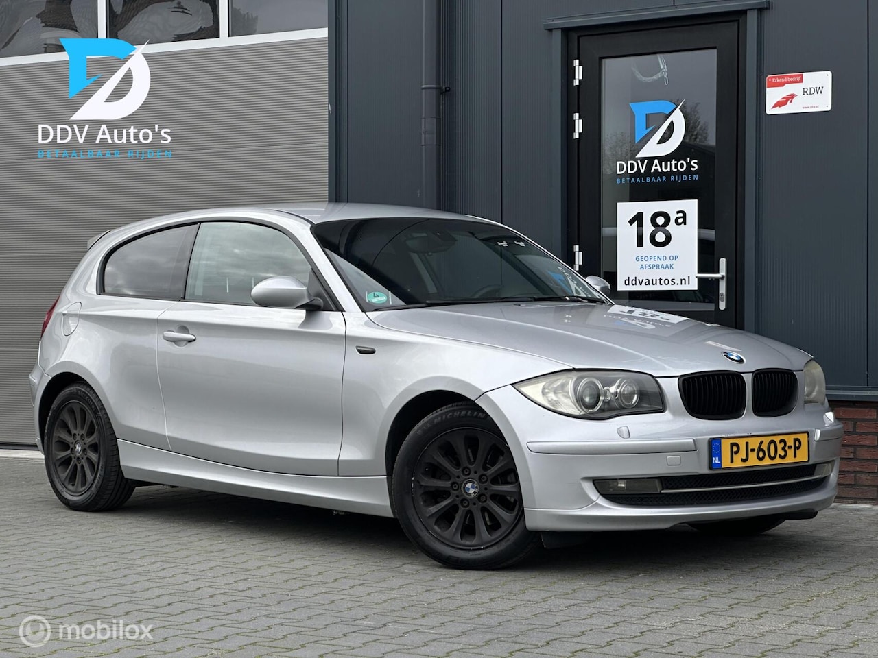 BMW 1-serie - 118d/143pk High Executive|2007|PDC|Cruise|Clima|Navi|Stoelverw.|Xenon|16"LMV - AutoWereld.nl