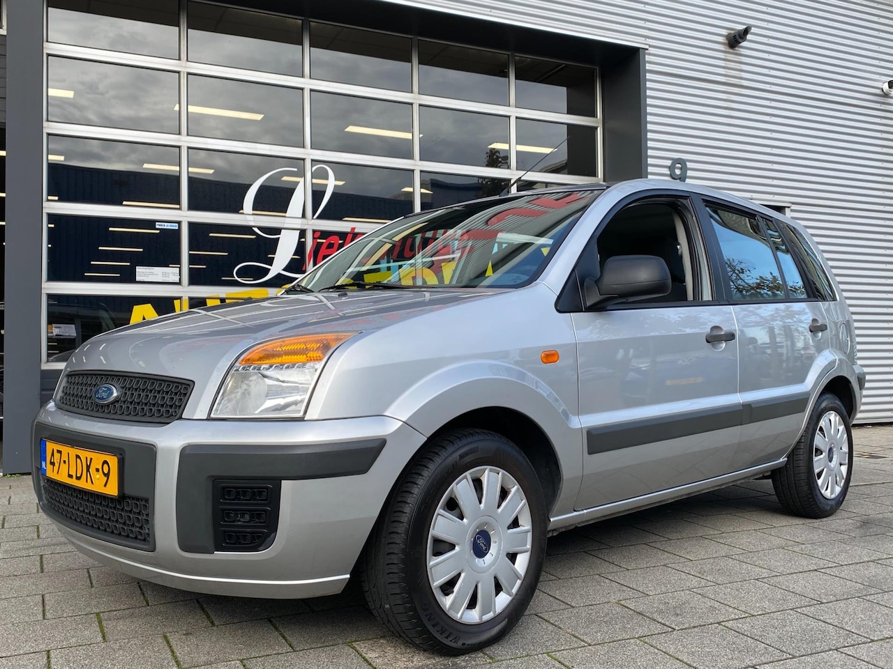 Ford Fusion - 1.4-16V Cool & Sound - Airco I Comfort pakket I Dealer onderhouden - AutoWereld.nl