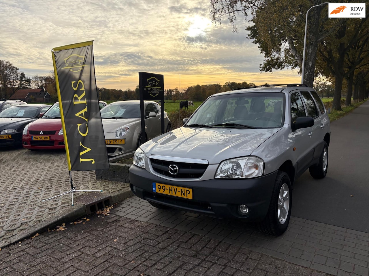 Mazda Tribute - 2.0 Exclusive 4WD - AIRCO,ELEKT PAKKET,DAKRAILS,SPORTVELGEN - AutoWereld.nl