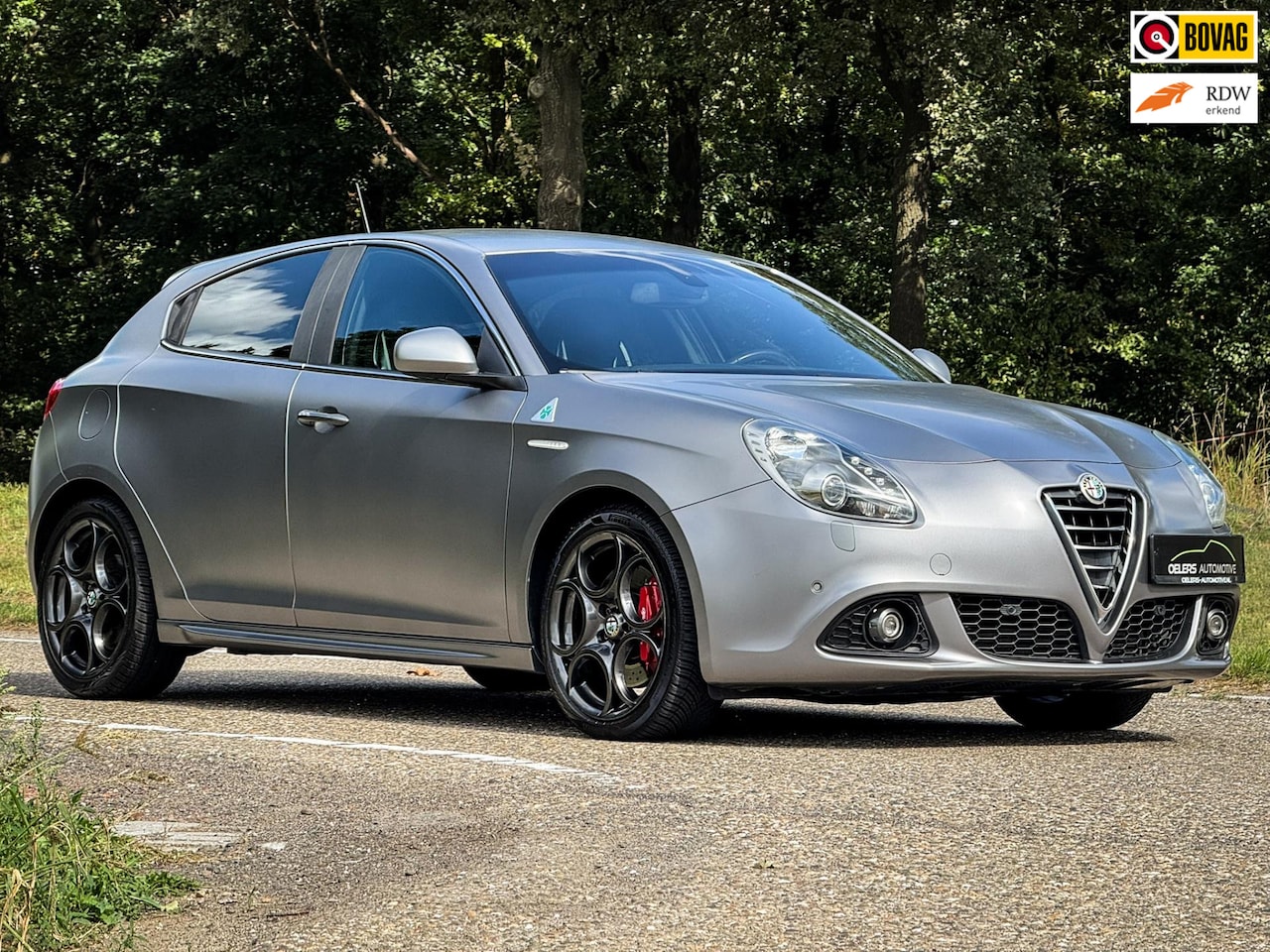 Alfa Romeo Giulietta - 1.7 TBi Quadrifoglio Verde | Matt grijs | Bose | Leder / alcantara | Navi | Clima | Cruise - AutoWereld.nl