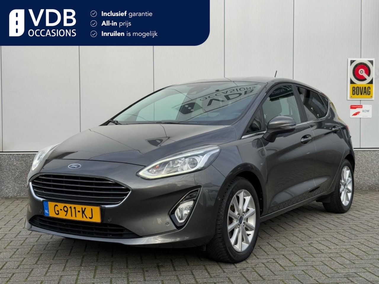 Ford Fiesta - 1.0 EcoB. Titanium | Stuurvw. | Navi | Camera | Carplay - AutoWereld.nl