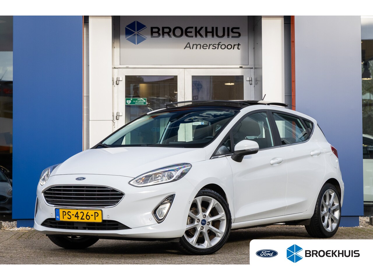 Ford Fiesta - 1.0 EcoBoost Titanium | Panorama-dak | Cruise adaptief | B&O audio | Camera | Apple Carpla - AutoWereld.nl