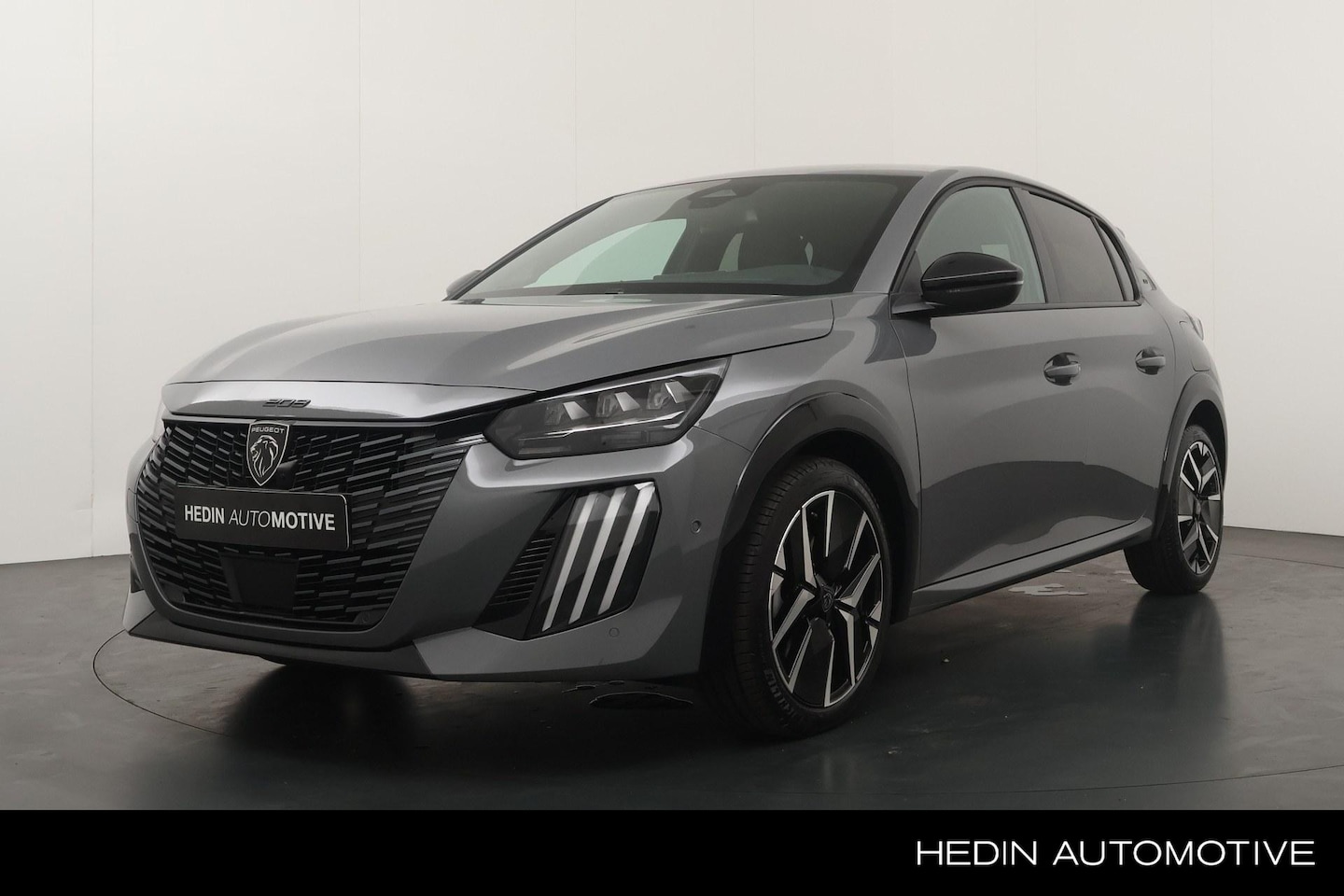 Peugeot 208 - 1.2 Hybrid 145 e-DCS6 GT Full Map Navigatie | Parkeer camera | Draadloze Telefoonlader | 1 - AutoWereld.nl