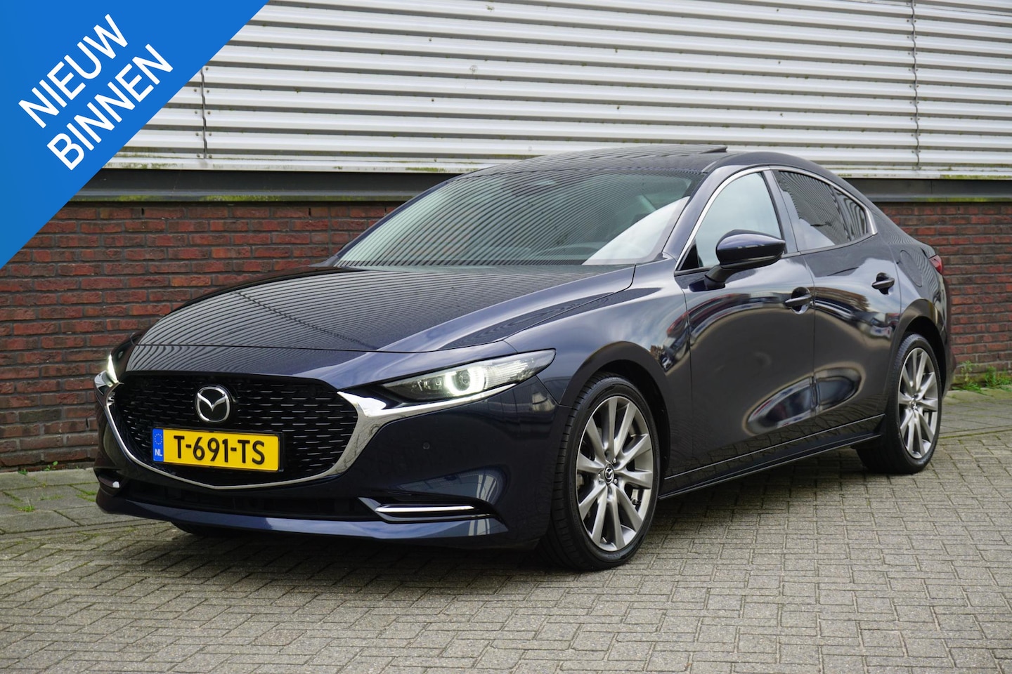 Mazda 3 - 2.0 e-SkyActiv-X M Hybrid 186PK Exclusive-line Leer/Automaat/Schuifdak. - AutoWereld.nl