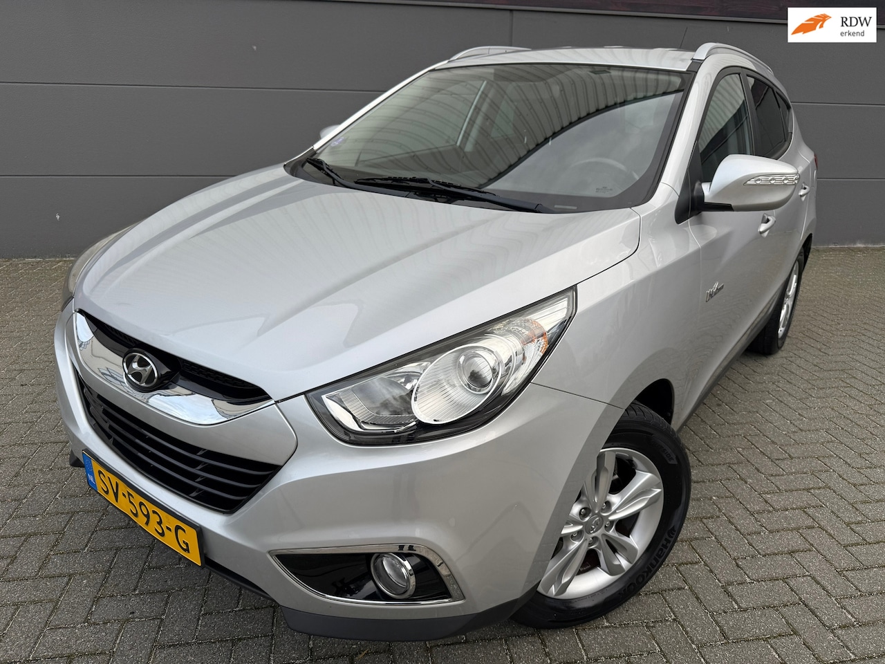 Hyundai ix35 - 1.6i GDI Business Edition*Camera*NAVI*KLEINE BEURT*NEW APK*Cruise*ClimatAirco*HAALF Leer*V - AutoWereld.nl