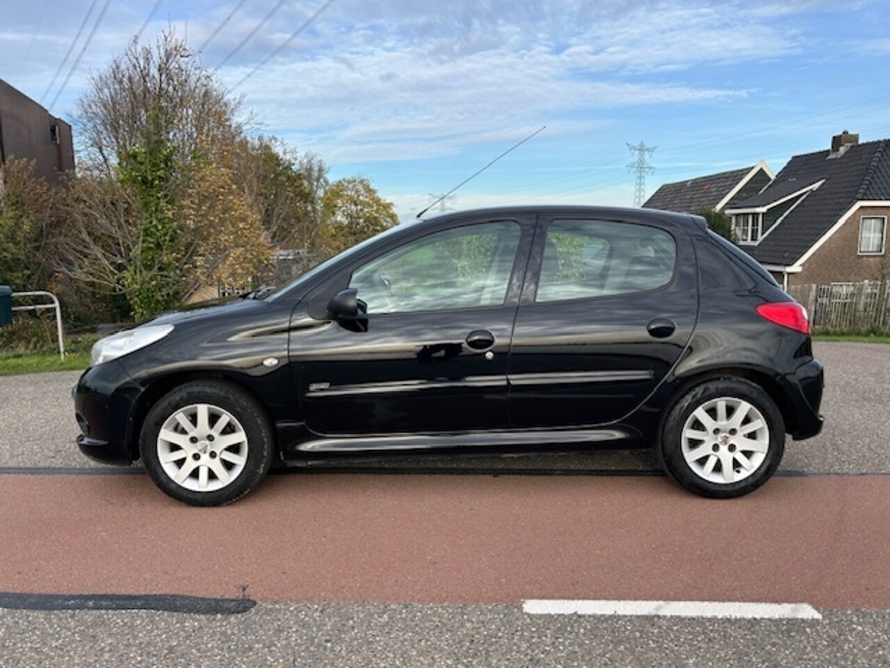 Peugeot 206 - 1.4 5 deurs 2011 112.000 km Nap cruise control nwe d-riem + Apk - AutoWereld.nl