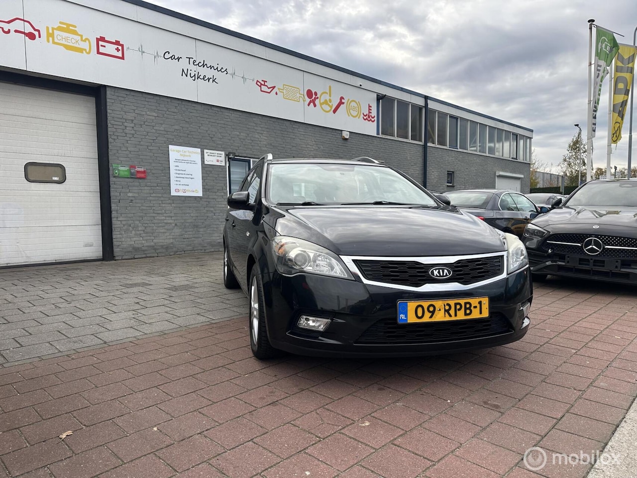 Kia Cee'd Sporty Wagon - 1.4 CVVT Seven 1.4 CVVT Seven - AutoWereld.nl