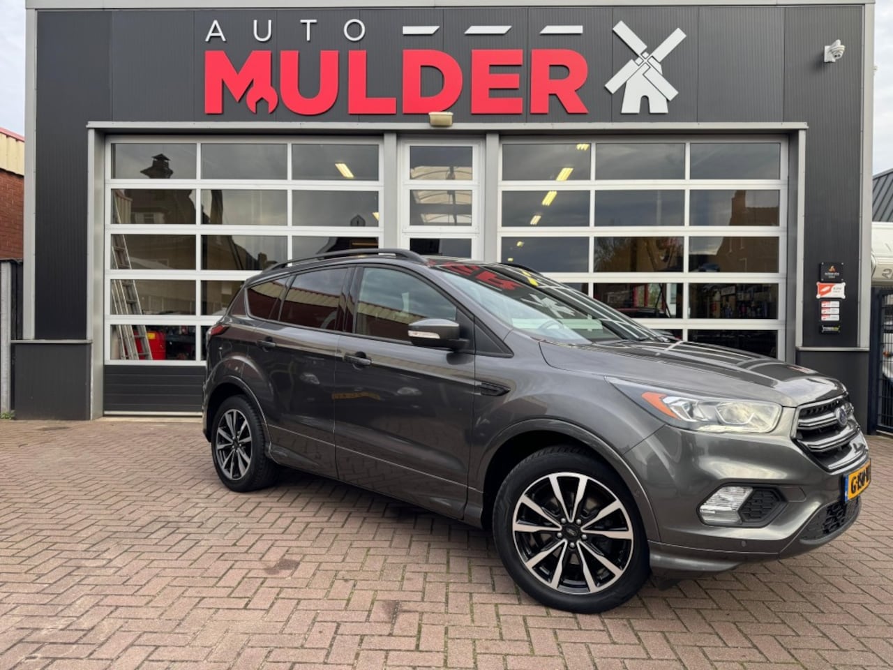 Ford Kuga - 1.5 ECOBOOST ST LINE / NAVI / CAMERA / CRUISE / TREKHAAK! - AutoWereld.nl