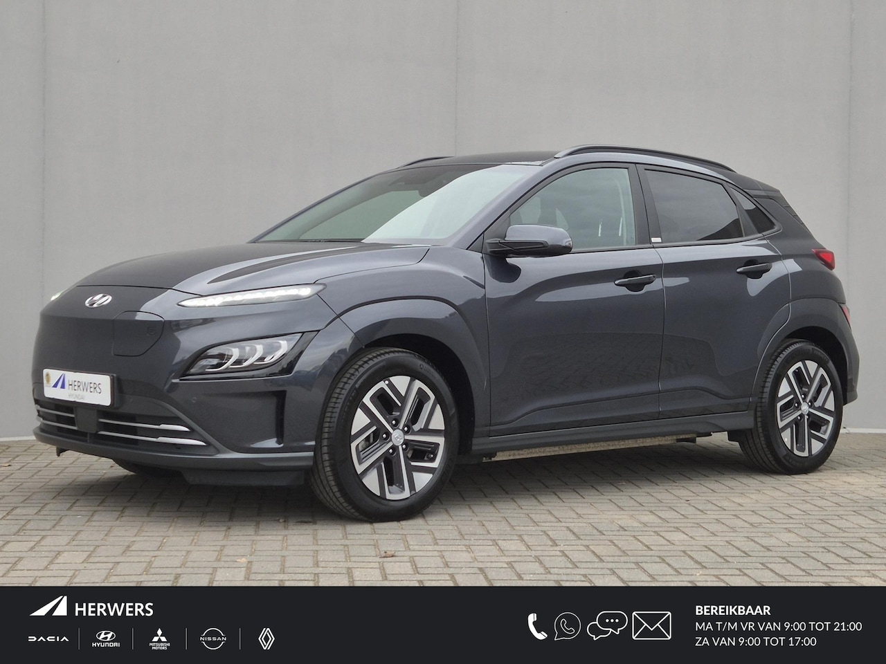 Hyundai Kona Electric - EV Comfort Smart 64 kWh Automaat / Accu SOH 98% / Dealer onderhouden / WLTP bereik 484 km - AutoWereld.nl