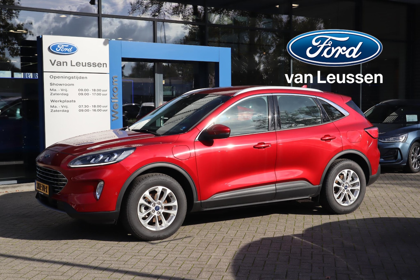Ford Kuga - 2.5 PHEV TITANIUM 4JR-GARANTIE! EL-TREKHAAK WINTERPACK BLISS 2xCAM AD-CRUISE HALF-LEDER P- - AutoWereld.nl