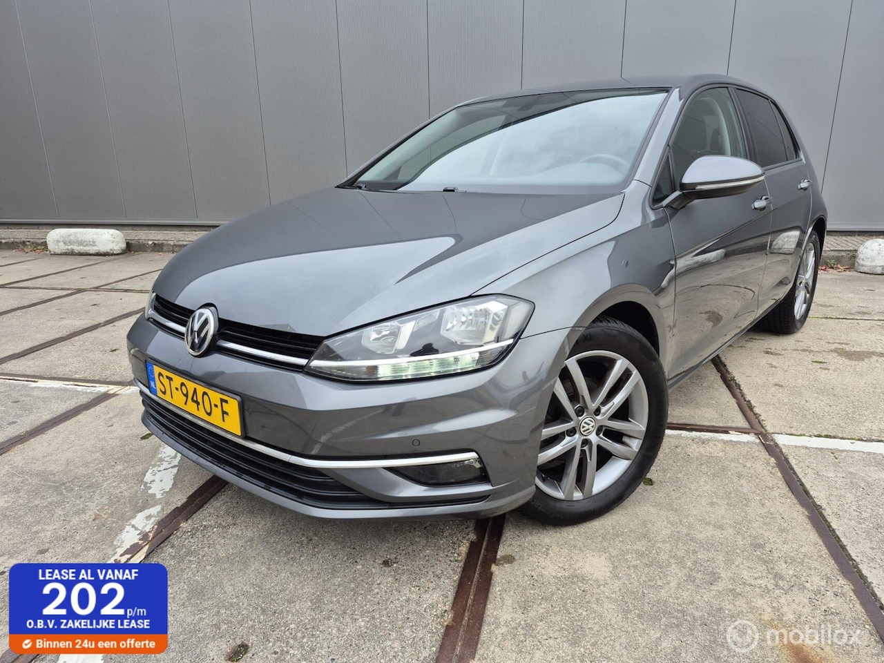 Volkswagen Golf - 1.0 TSI Navi / Automaat / Cruise / Stoelverwarming / Clima / PDC - AutoWereld.nl