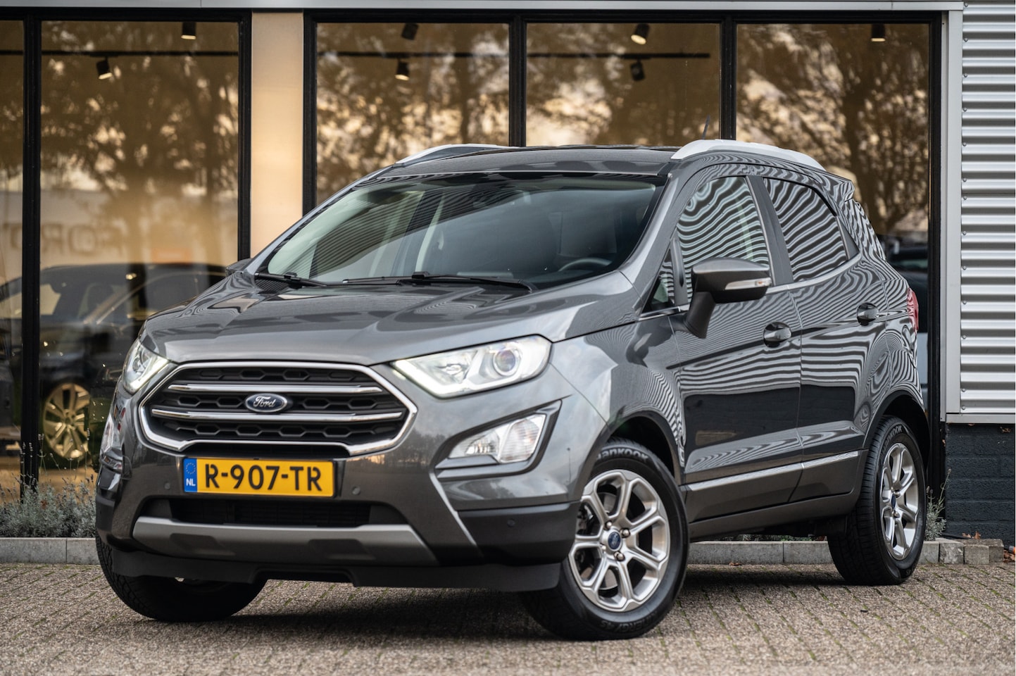 Ford EcoSport - 1.0 Titanium Automaat | Navi | Apple CarPlay | Afn. Trekhaak | B&O | Stoel- Stuurverw. | P - AutoWereld.nl
