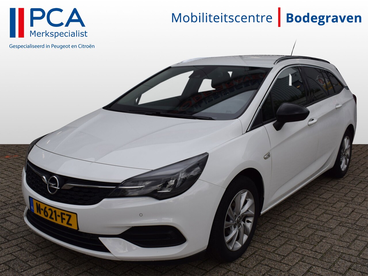 Opel Astra Sports Tourer - 1.2 Business Elegance | Trekhaak | Camera | NL-Auto - AutoWereld.nl