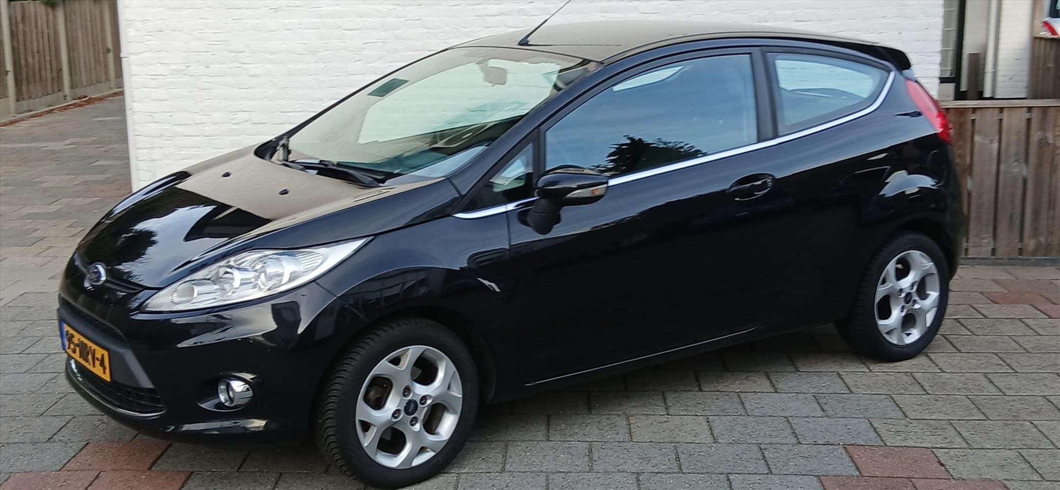 Ford Fiesta - 1.2 3drs titaan airco 96000 km - AutoWereld.nl