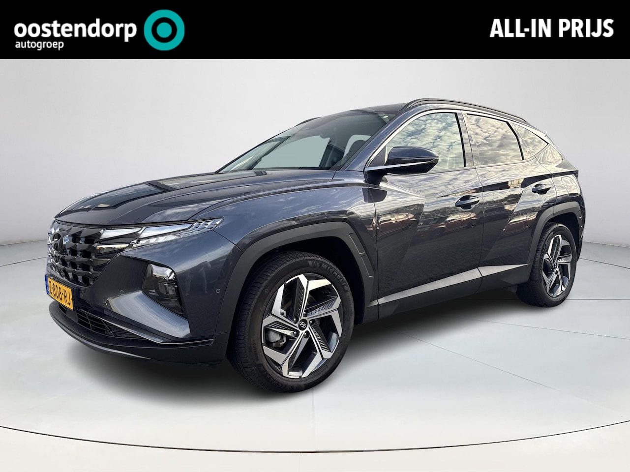 Hyundai Tucson - 1.6 T-GDI PHEV Premium 4WD Lederen bekleding | Stoel- en stuurverwarming | 4WD | Navigatie - AutoWereld.nl