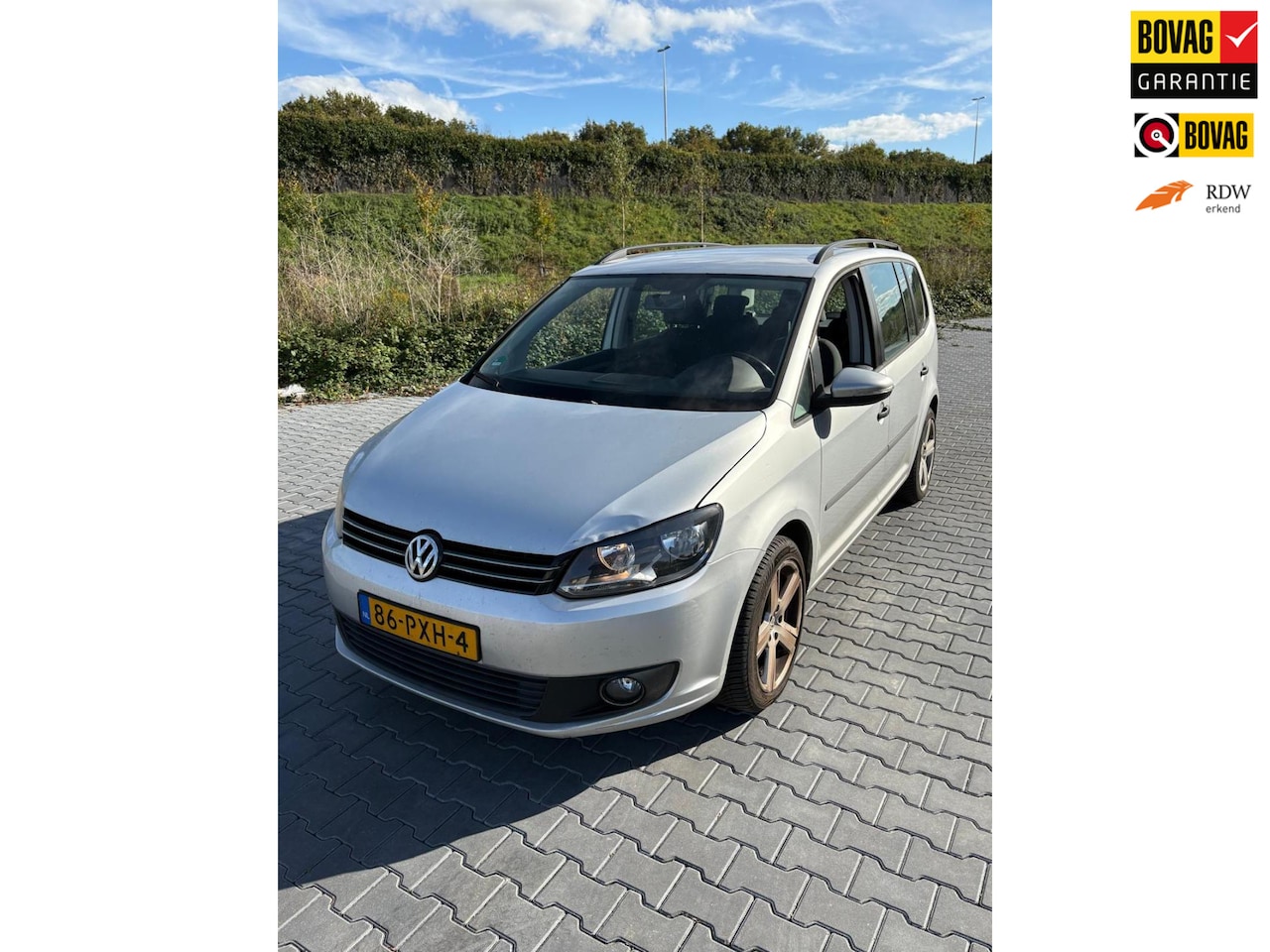 Volkswagen Touran - 1.6 TDI Trendline BlueMotion7p. 1.6 TDI Trendline BlueMotion7p. - AutoWereld.nl