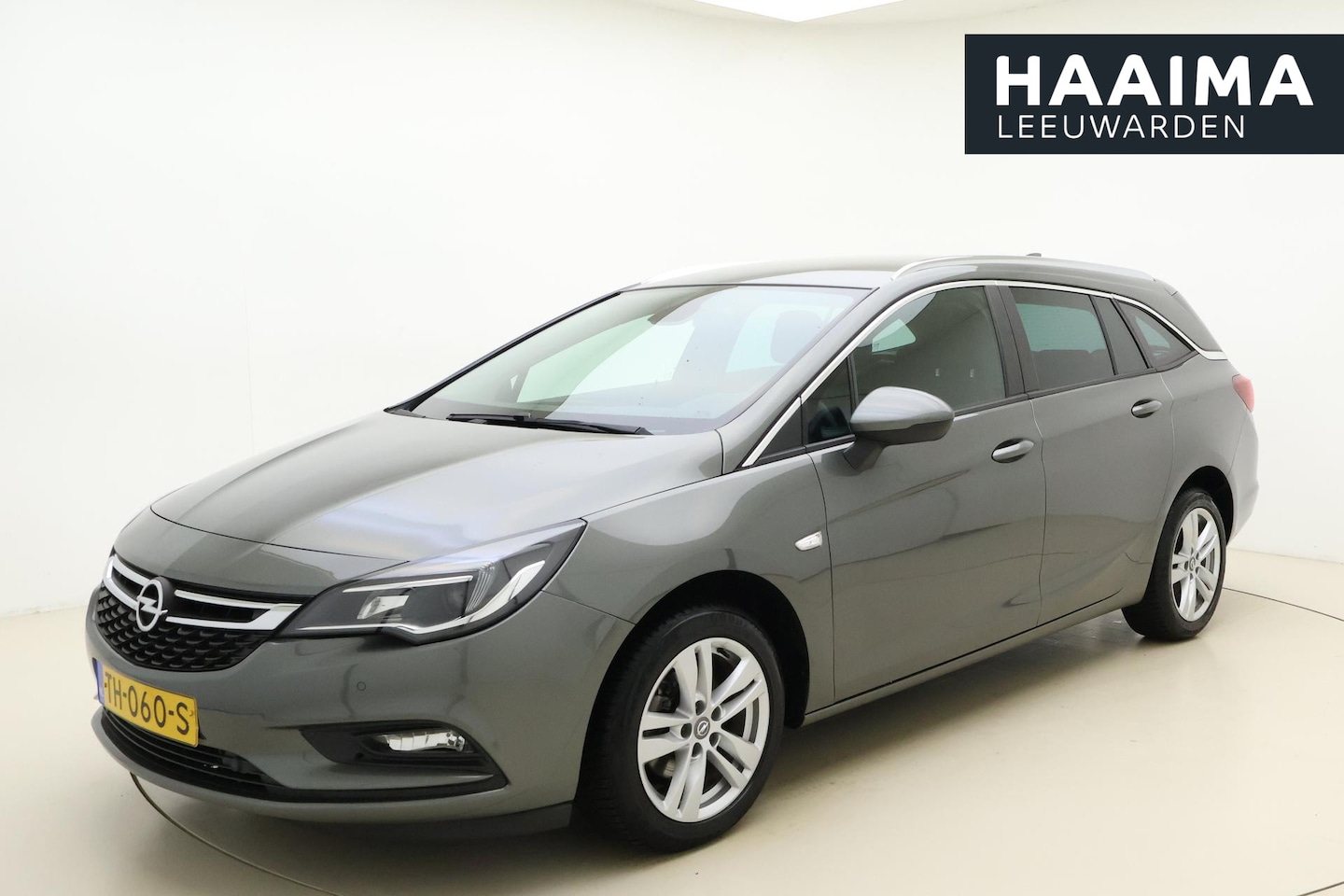 Opel Astra Sports Tourer - 1.4 Online Edition 149 PK | Handgeschakeld | Trekhaak | Parkeersensor | Navigatie | Cruise - AutoWereld.nl