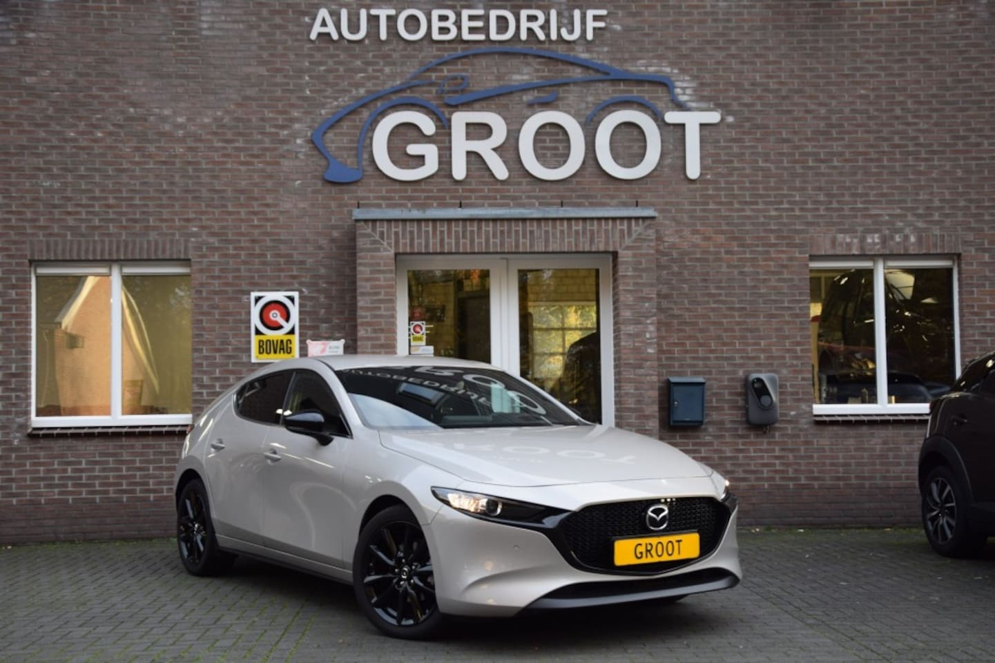 Mazda 3 - 2.5 E-SA-G HOMURA - AutoWereld.nl