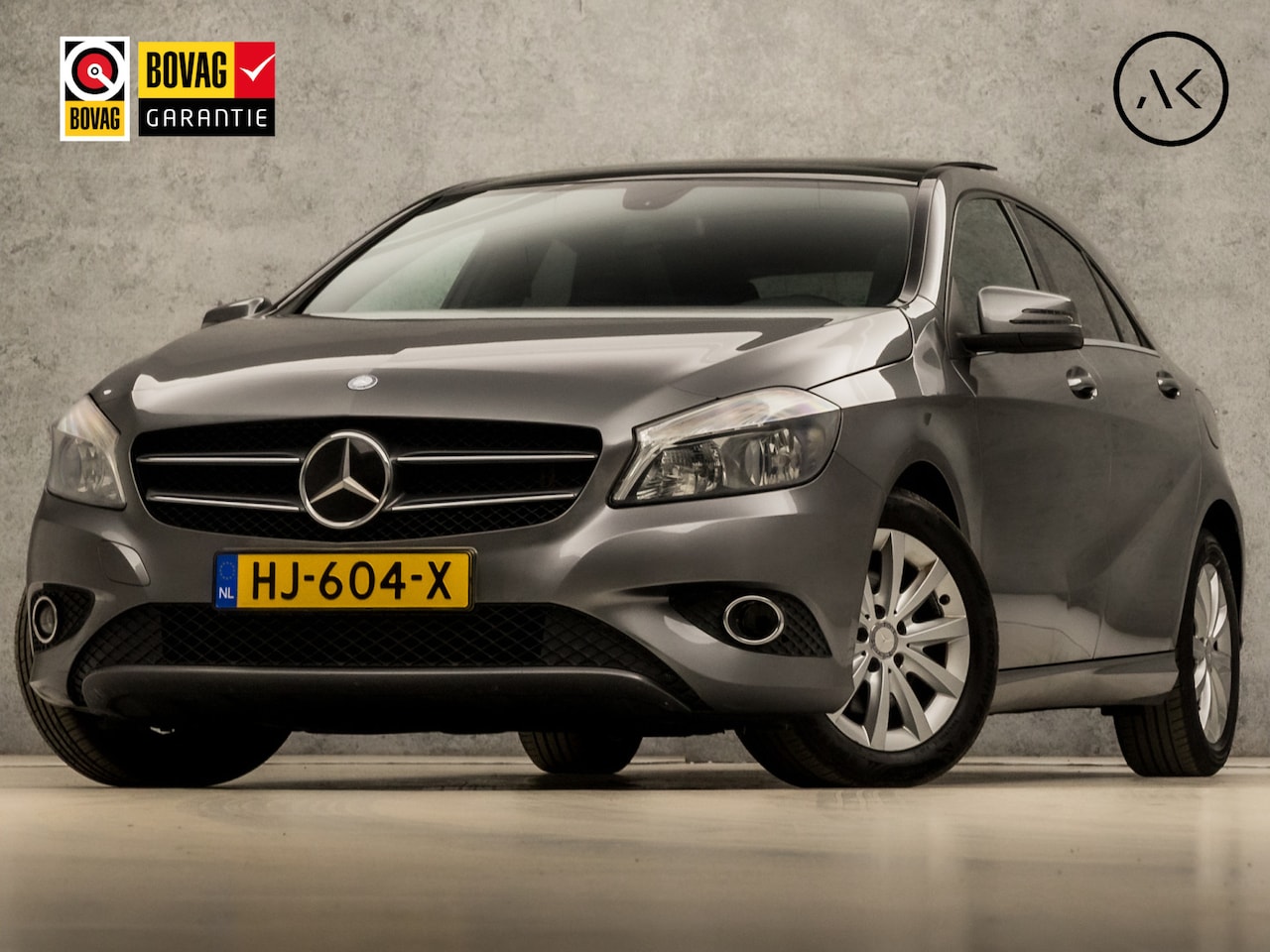 Mercedes-Benz A-klasse - 180 Ambition Sport Automaat (SCHUIFDAK, NAVIGATIE, LEDER, CAMERA, STOELVERWARMING, ZWART H - AutoWereld.nl