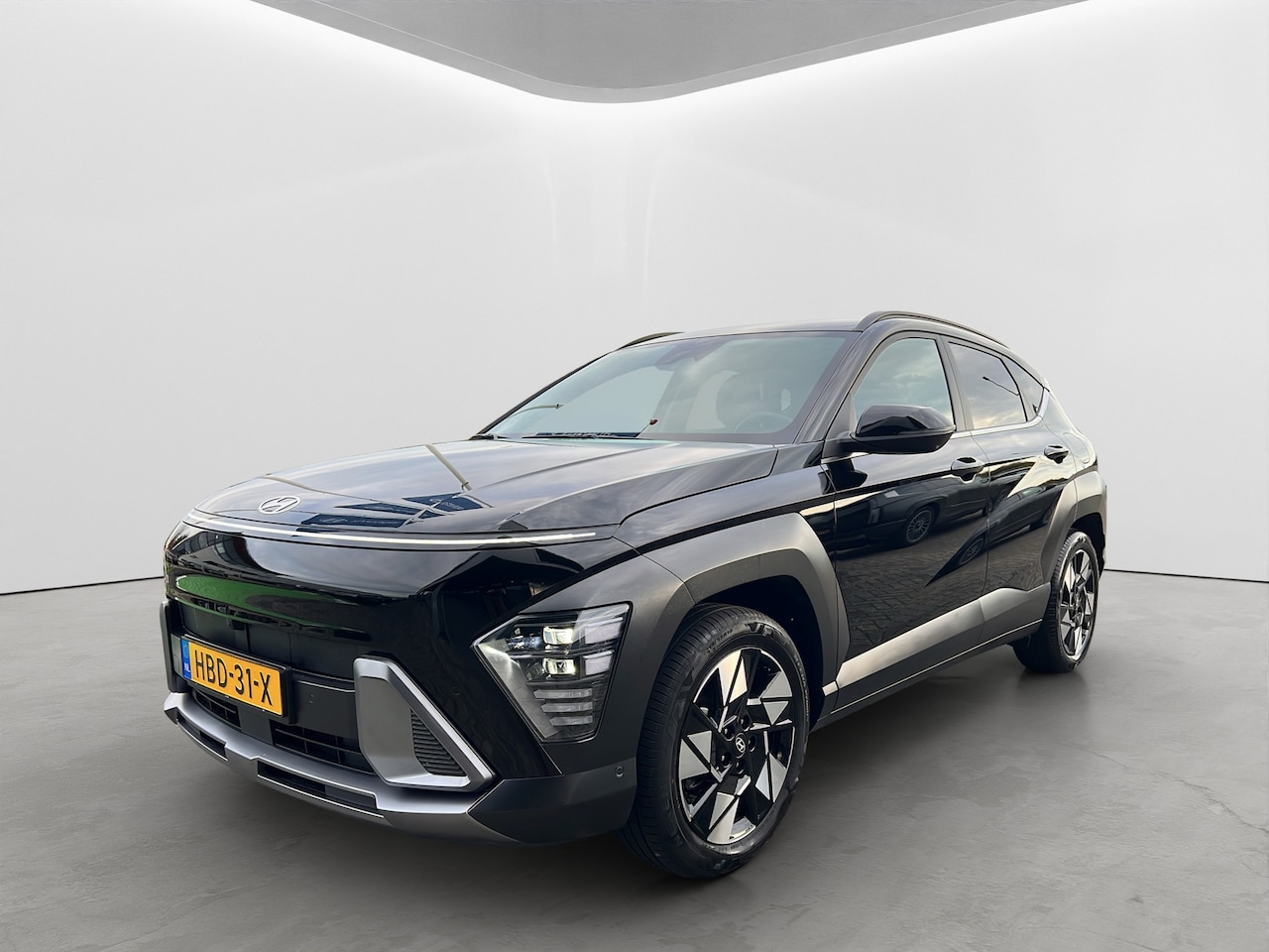 Hyundai Kona - 1.6 GDI 141pk HEV Premium | Premium audio | 360 camera | Bestuurdersstoel met geheugen | A - AutoWereld.nl