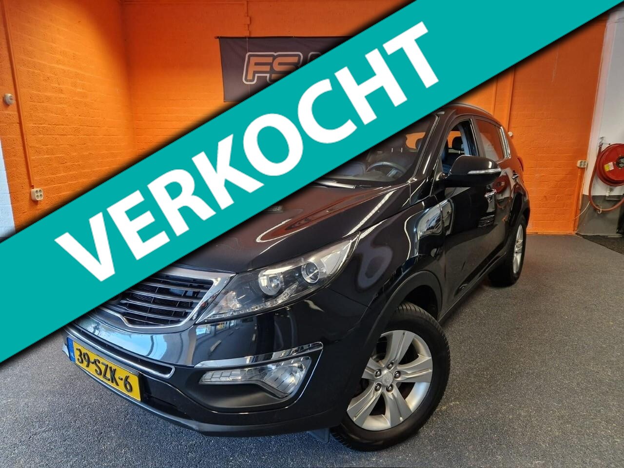 Kia Sportage - 2.0 X-ecutive Plus Pack / Div.Optie's / APK 31-10-2026 - AutoWereld.nl