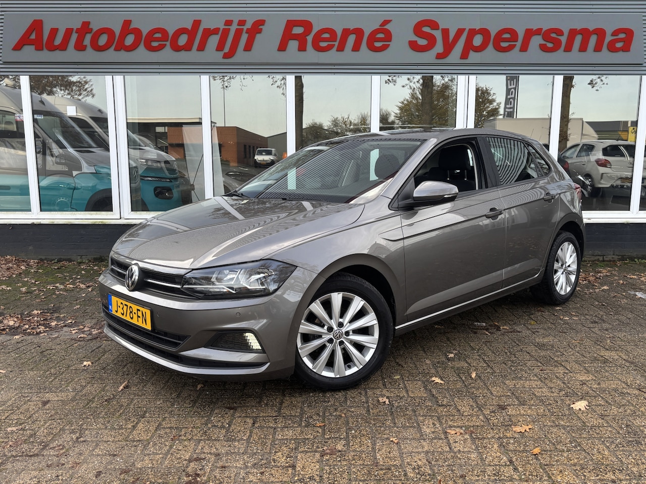 Volkswagen Polo - 1.0 TSI Highline Business | Parkeer Sensoren | Stoelverwarming | Navi | Cruise - AutoWereld.nl
