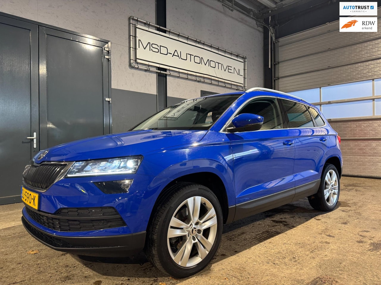 Skoda Karoq - 1.0 TSI Style Launch Edition|CARPLAY|PDC|NAP|Trekhaak|Keyless!! - AutoWereld.nl