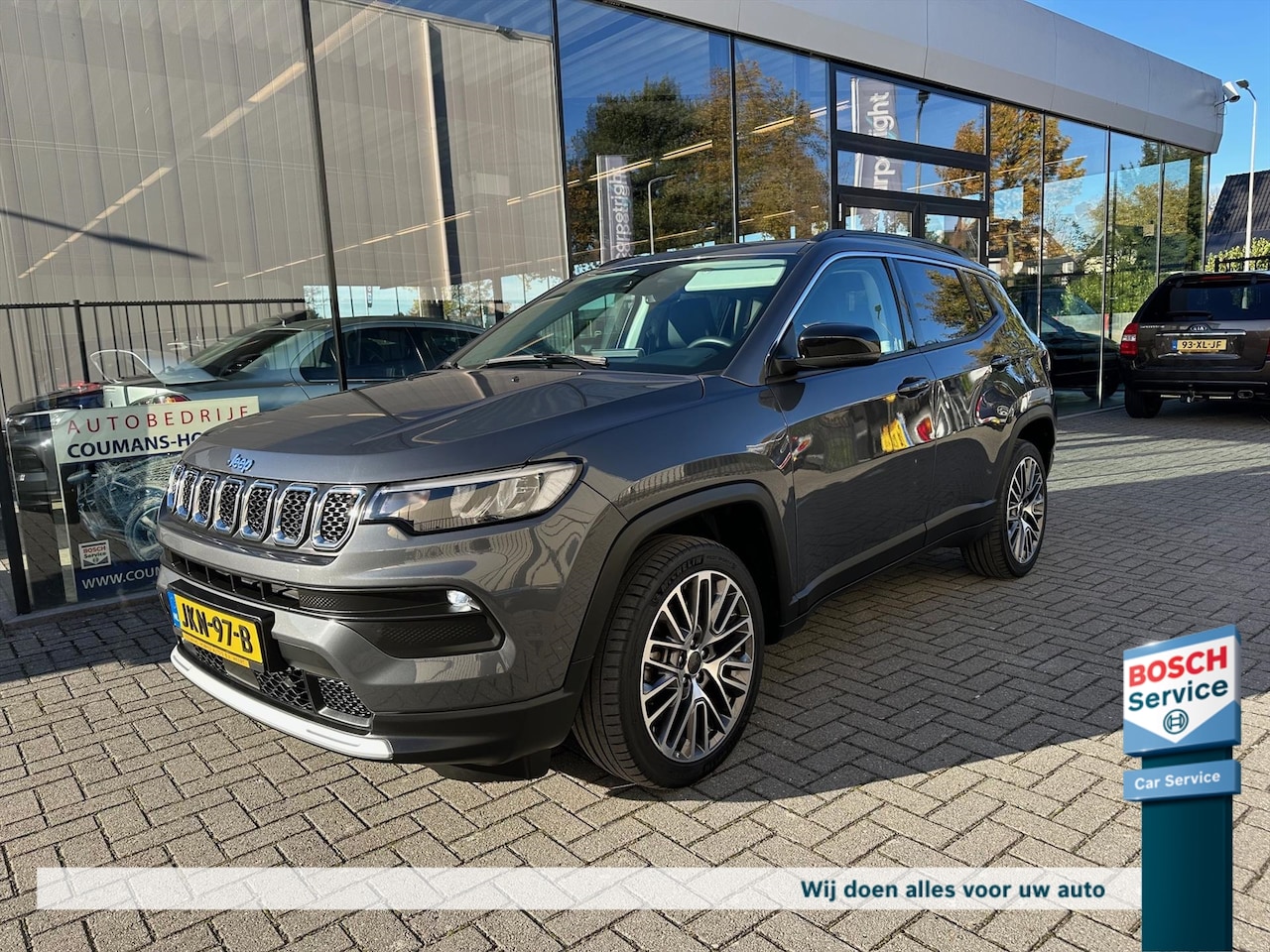 Jeep Compass - 4XE PLUG IN HYBRID Automaat Limited Business PANORAMADAK - AutoWereld.nl