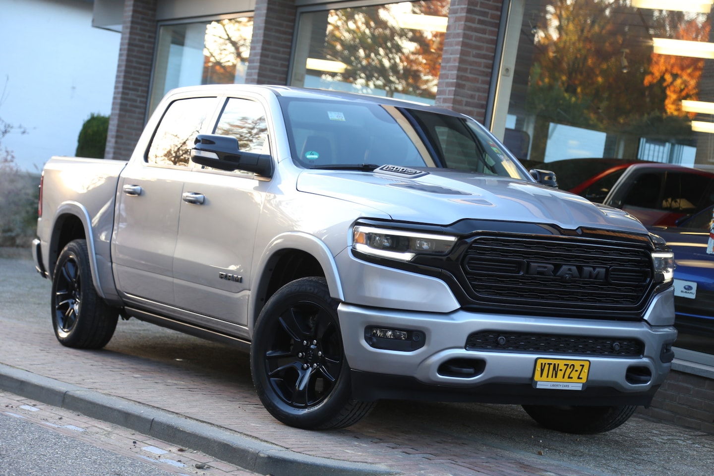 Dodge Ram 1500 - 5.7 V8 4x4 Crew Cab Limited Luchtvering Pano ACC HK 360cam Stoelverkoeling - AutoWereld.nl