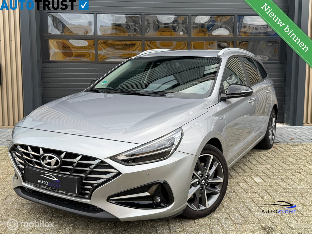 Hyundai i30 Wagon - 1.5 T-GDi MHEV Premium| Led | Stuur & Stoel verwarming - AutoWereld.nl