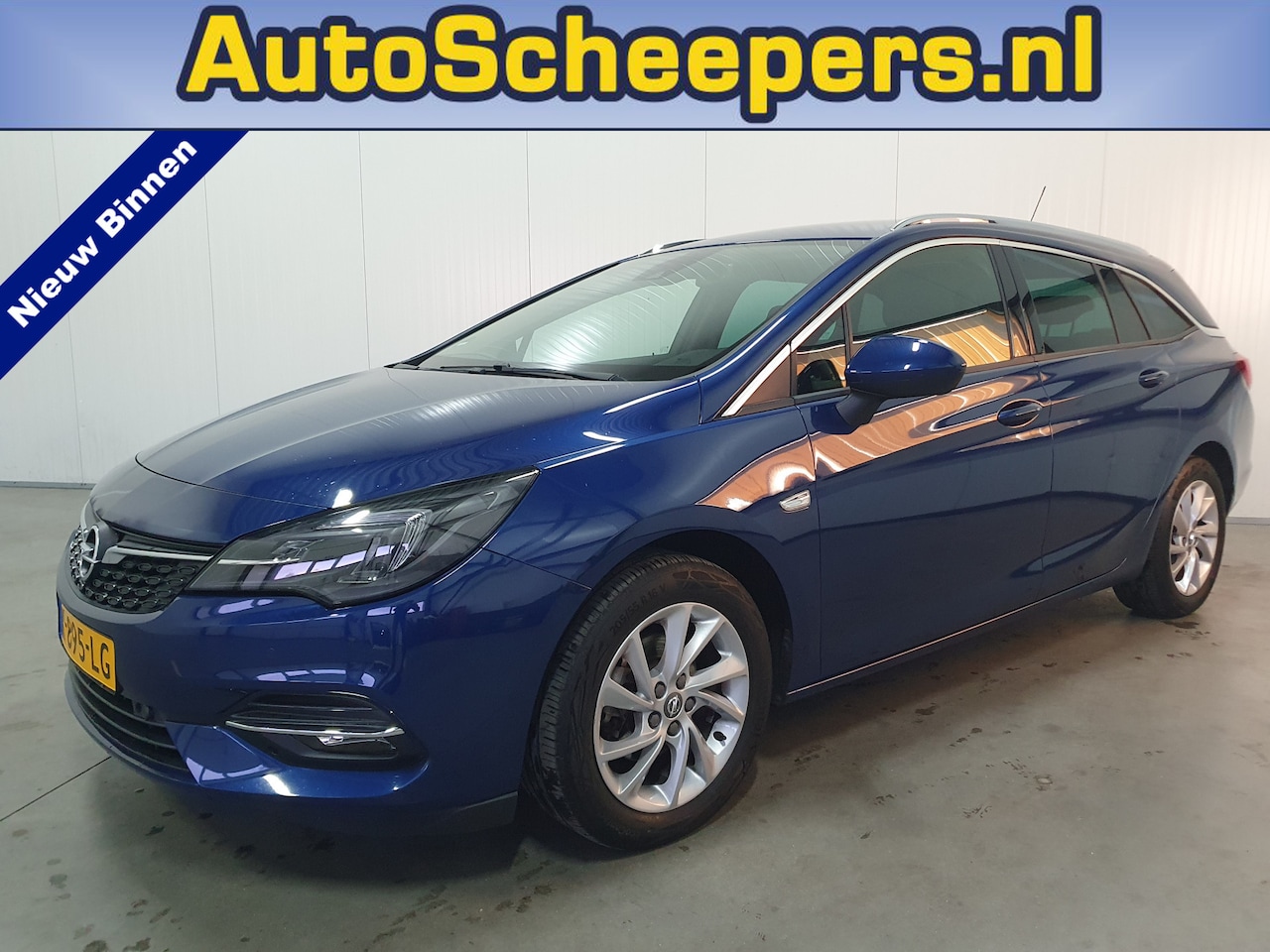 Opel Astra Sports Tourer - 1.2 Business Elegance NAVI/CARPLAY/LED/CRUISE/CLIMA - AutoWereld.nl