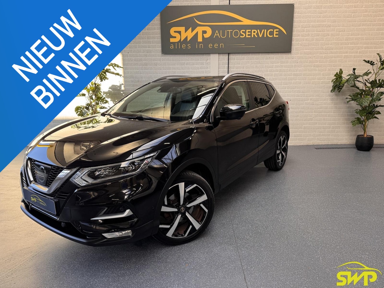 Nissan Qashqai - 1.2 Tekna | Elektrische stoelen | Pano | Navi | 360 - AutoWereld.nl