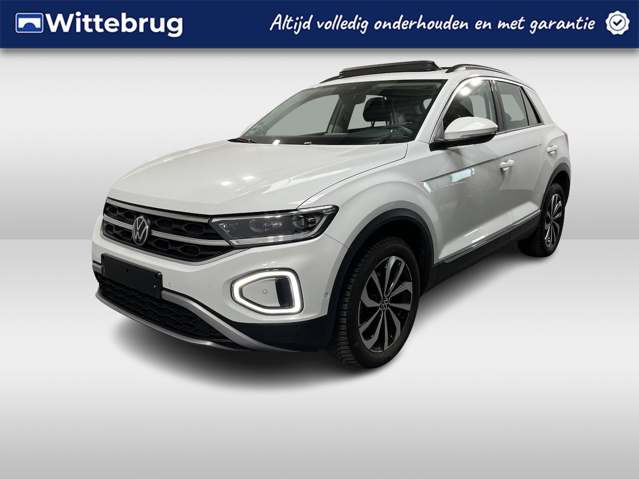 Volkswagen T-Roc - 1.5 TSI Style / AUTOMAAT/ TREKHAAK/ CAMERA/ PARK. SENSOREN/ LEDEREN MEMORY SEATS/ KEYLESS/ - AutoWereld.nl