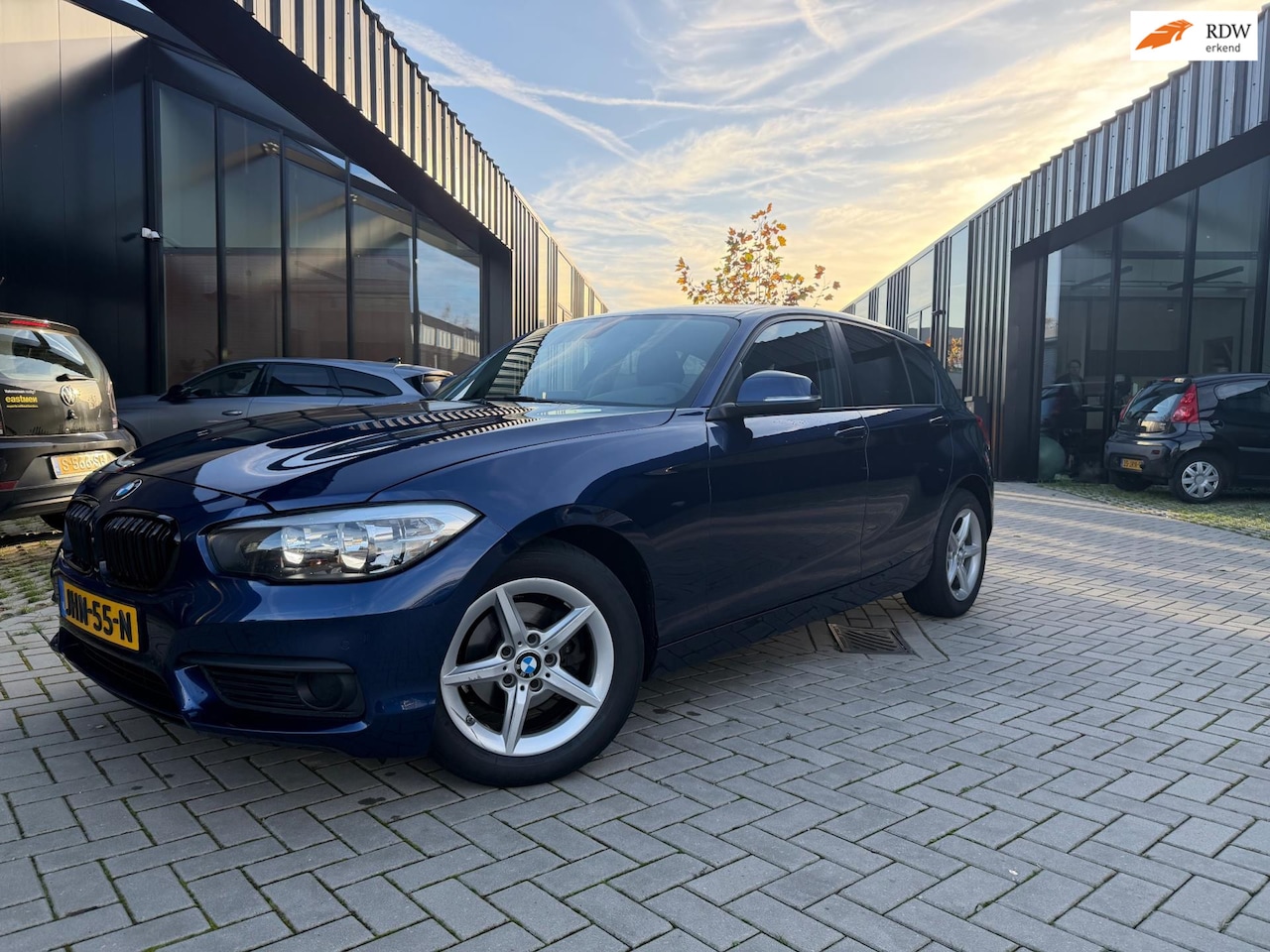 BMW 1-serie - 116i Sport Clima Leer PDC Navi Stoelvw - AutoWereld.nl